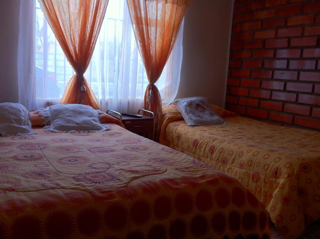Hostel Melinda Пуэрто-Наталес Номер фото
