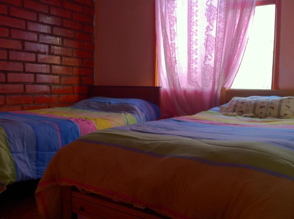 Hostel Melinda Пуэрто-Наталес Номер фото