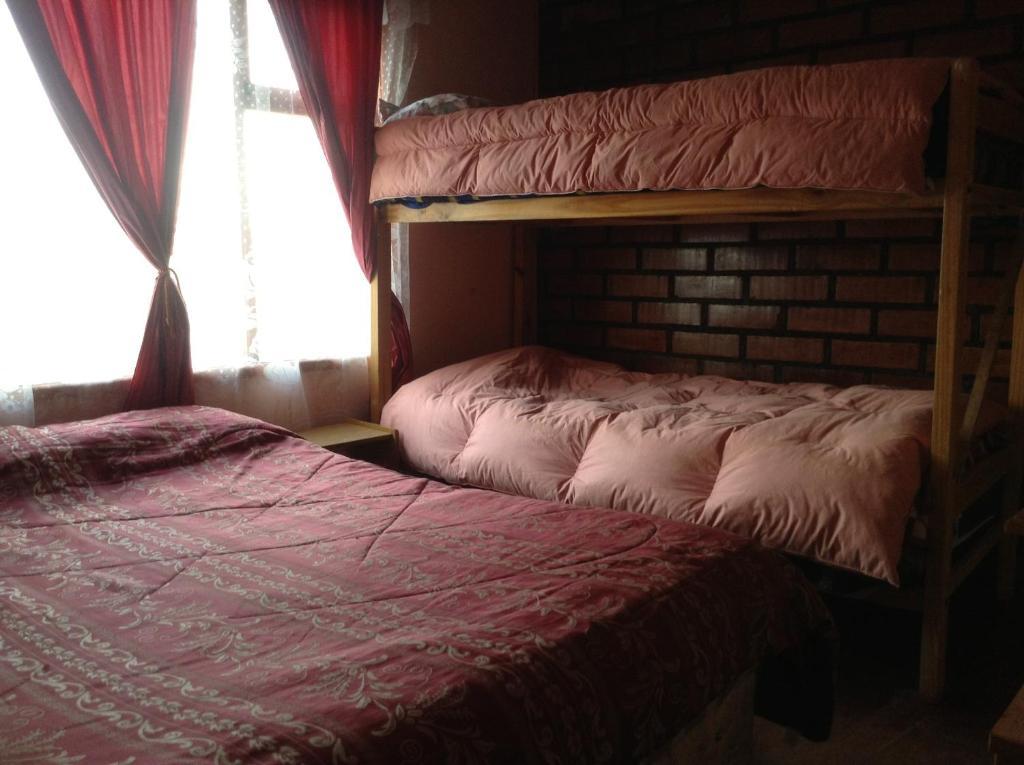 Hostel Melinda Пуэрто-Наталес Номер фото